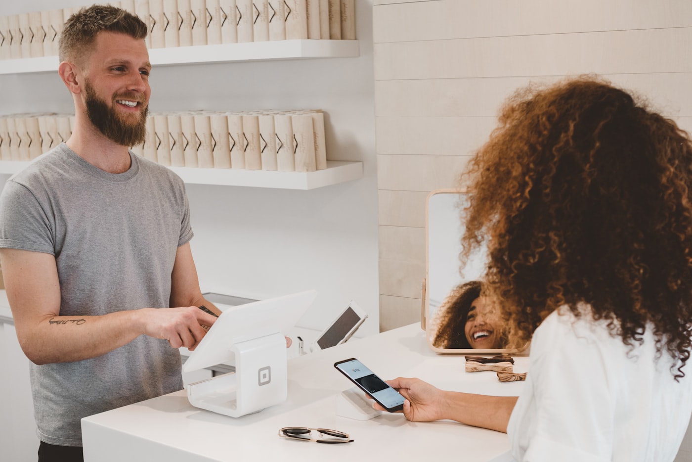 A customer paying a business in person