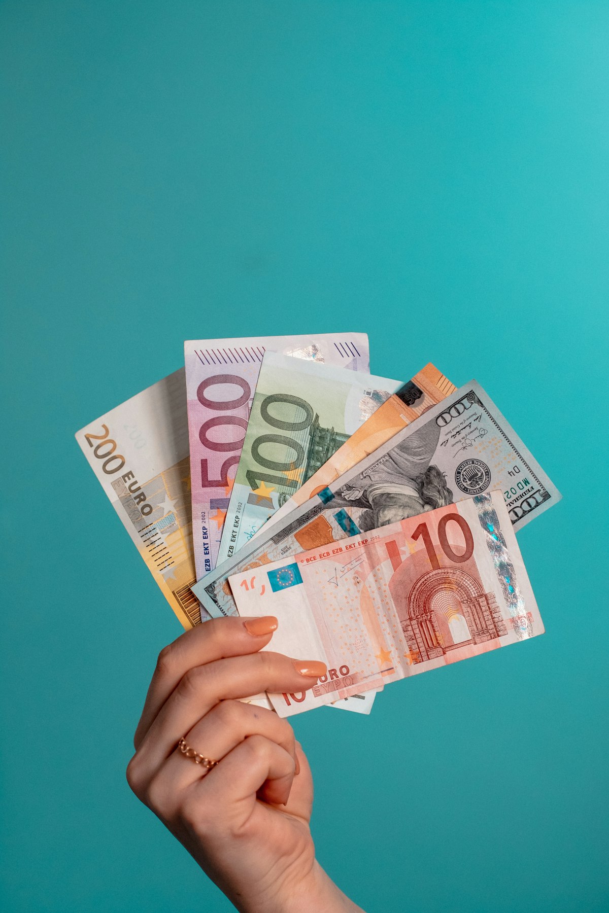 Banknotes in multiple currencies fanned out